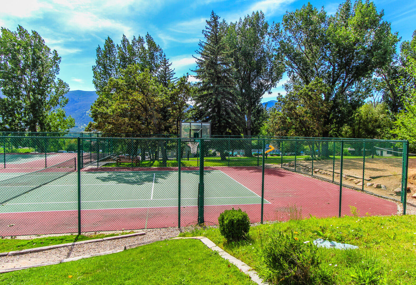 A spacious tennis and basketball court at VRI's Wolf Creek Village I in Eden, Utah.